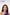 Woman wearing a purple top with uLook elegant' branding on a white background TR