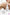 uLOOK Bakuchiol Serum bottle with a blurred background of a person's face TR