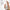 Hand holding a uLook eye contour cream bottle with product features listed on a white background US